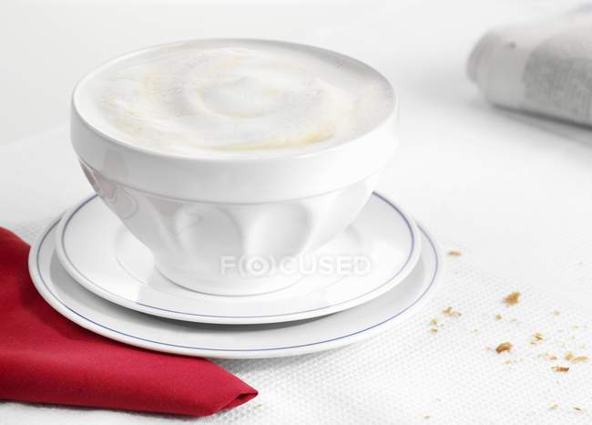 Closeup view of coffee with milk in white bowl — Stock Photo