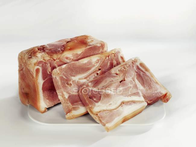 Partly sliced Pressed ham — Stock Photo