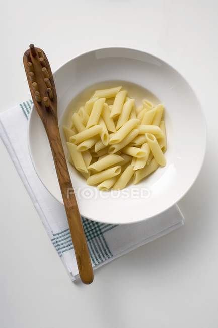 Plate of penne rigate pasta — Stock Photo