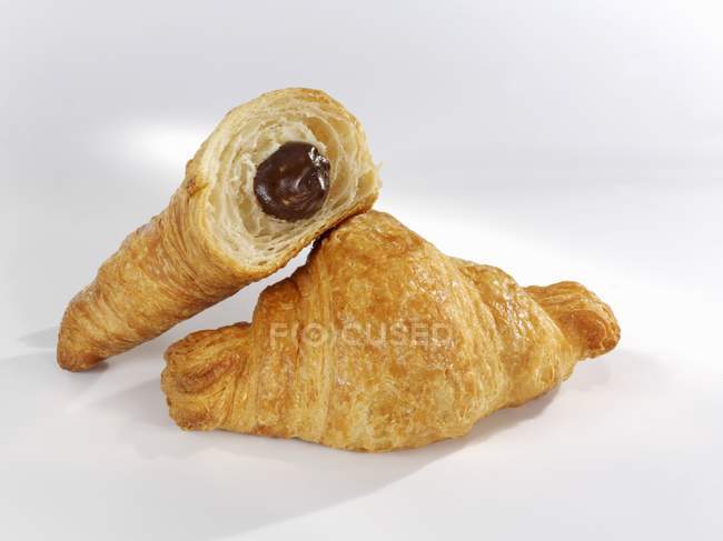 Croissant with chocolate filling — Stock Photo
