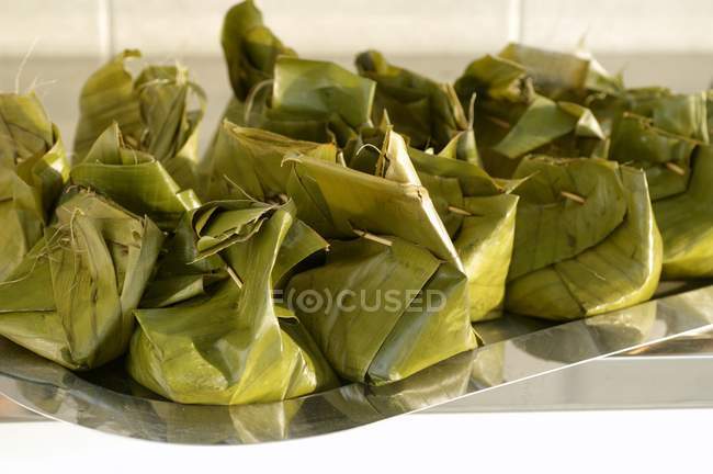 Bamboo and pork in leaf — Stock Photo