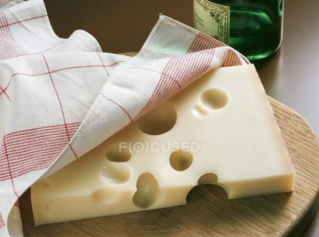 Emmental cheese with cloth — Stock Photo