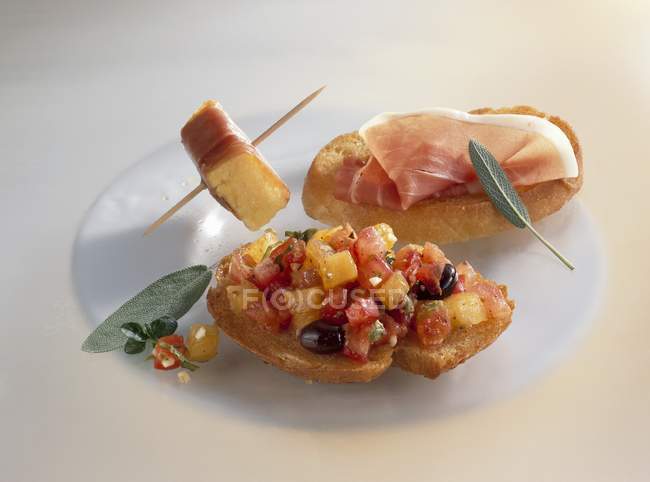 Parma ham on bread — Stock Photo