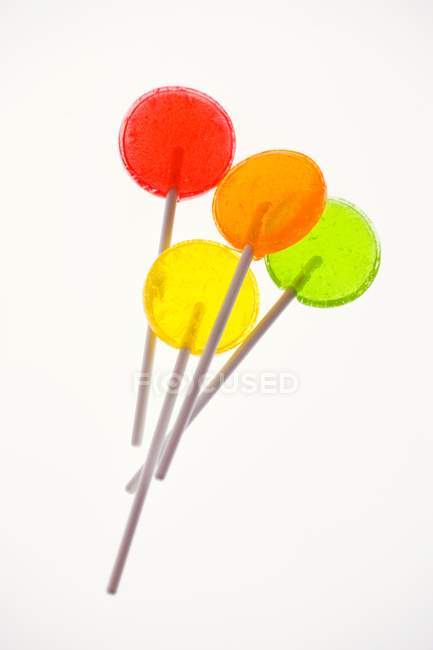 Four coloured lollipops — Stock Photo