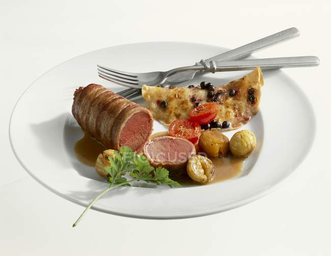 Loin of chamois with glazed chestnuts — Stock Photo