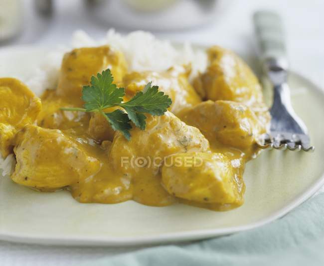 Chicken in almond curry sauce — Stock Photo