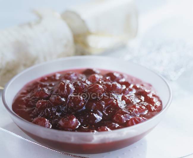 Closeup view of cranberry sauce in glass bowl — Stock Photo