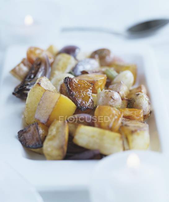 Roasted vegetables on white plate — Stock Photo
