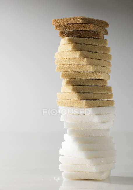 Tower of different types of sugar — Stock Photo