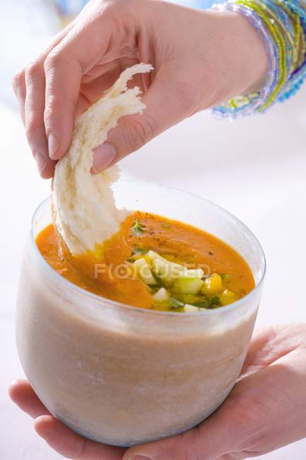 Bread in gazpacho in bowl — Stock Photo
