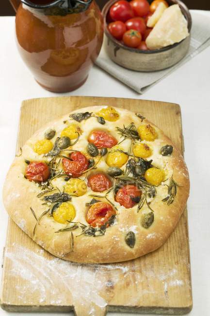 Pizza with cherry tomatoes — Stock Photo