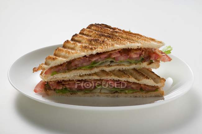 Toasted bacon, lettuce and tomato sandwiches — Stock Photo