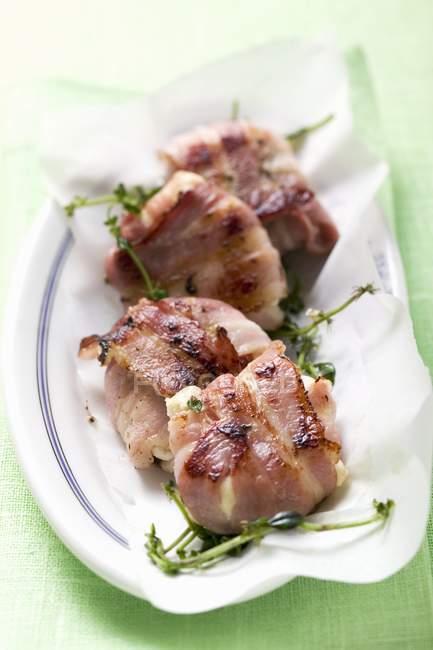 Goat's cheese wrapped — Stock Photo