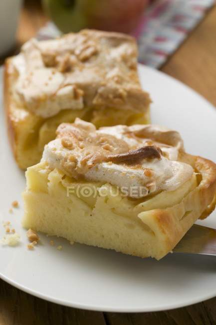 Pieces of apple meringue cake — Stock Photo