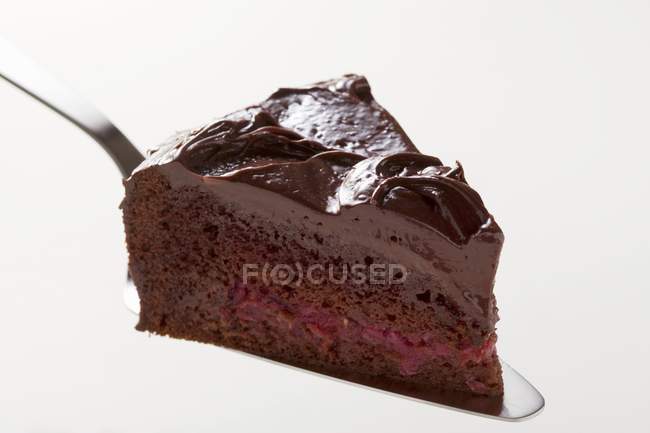 Slice of chocolate cake — Stock Photo
