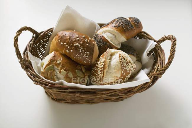 Pretzel rolls in bread basket — Stock Photo
