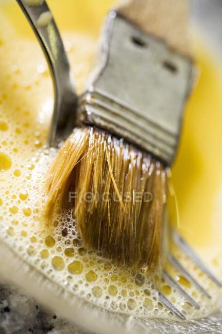 Egg yolk with pastry — Stock Photo