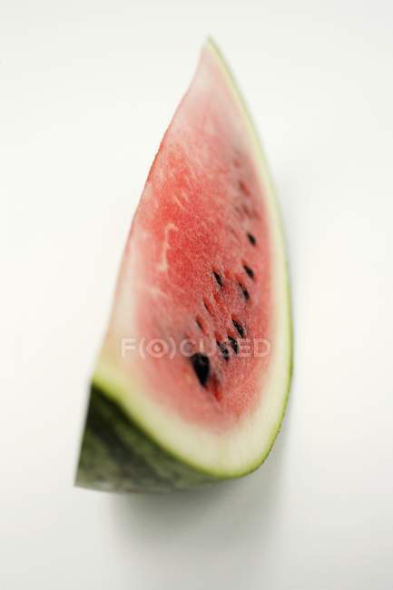 Juicy slice of watermelon — Stock Photo