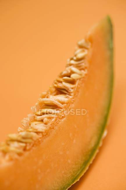Slice of cantaloupe melon — Stock Photo