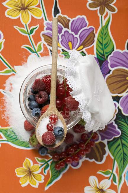 Berries in jam jar — Stock Photo