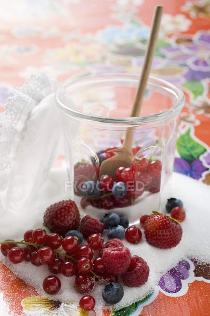 Berries in jam jar — Stock Photo