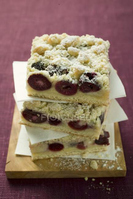 Cherry crumble cake in pile — Stock Photo