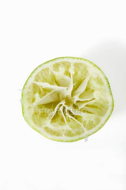 Half lime squeezed — Stock Photo