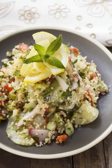 Couscous salad with vegetables — Stock Photo