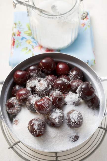 Sugared cherries in pan — Stock Photo