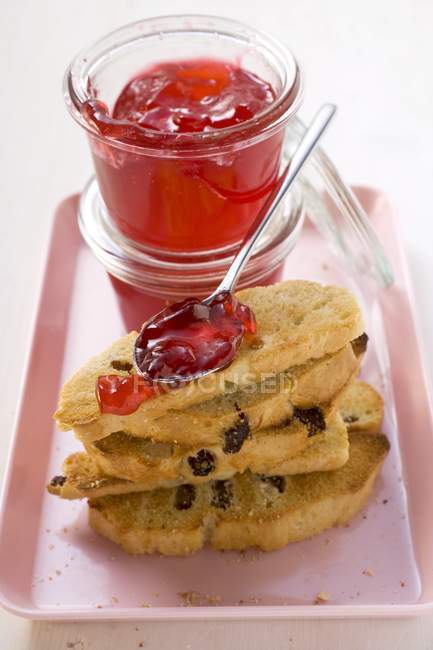 Redcurrant jelly in jar — Stock Photo