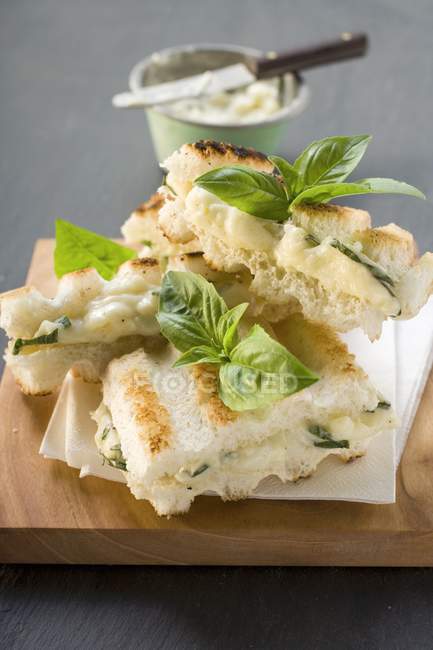 Closeup view of toasted Tramezzini with basil mayonnaise — Stock Photo