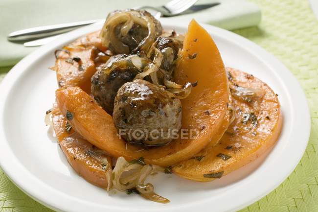 Meatballs with roasted wedges — Stock Photo