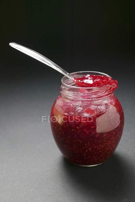 Raspberry jam in jar — Stock Photo