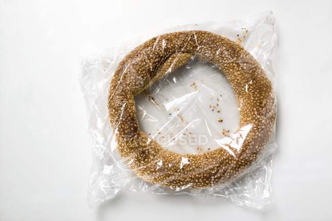 Sesame ring in clear packaging — Stock Photo