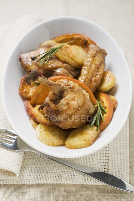 Roasted  Chicken with oranges and rosemary — Stock Photo