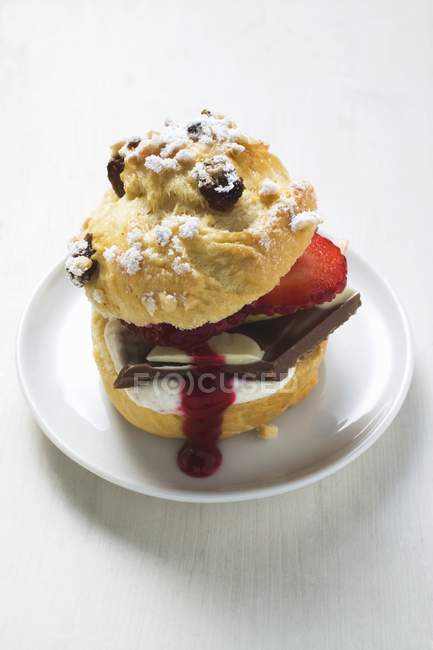 Sweet chocolate burger with strawberries — Stock Photo