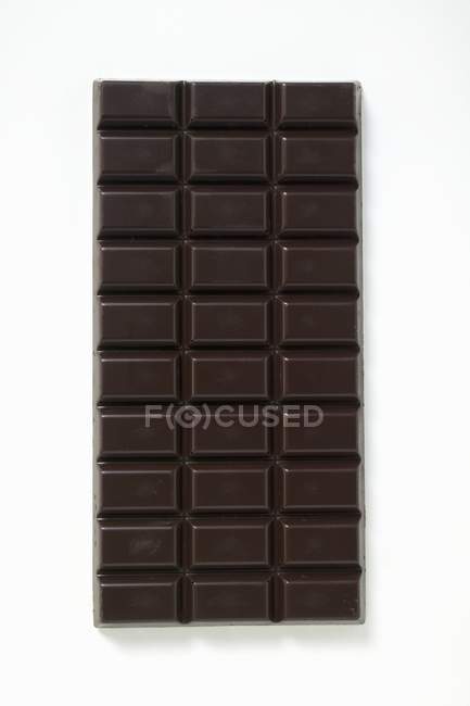 Bar of dark chocolate — Stock Photo