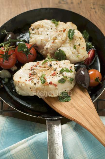 Monk-fish cutlets with cherry tomatoes — Stock Photo