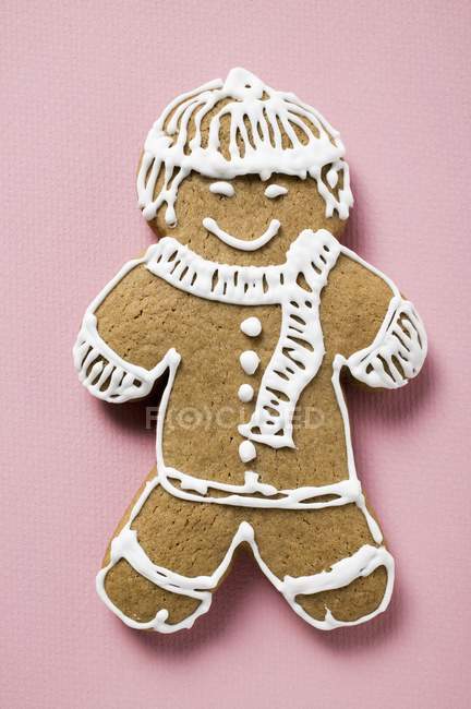 Closeup view of one gingerbread man decorated with white icing — Stock Photo