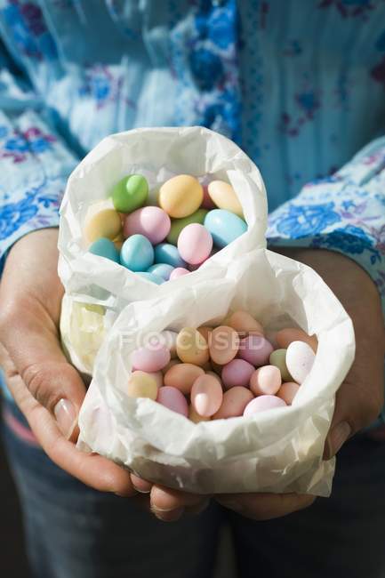 Paper bags of Easter sweets — Stock Photo