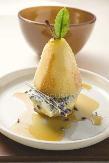 Poached pear with cheese — Stock Photo