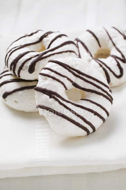 Meringue rings with chocolate stripes — Stock Photo