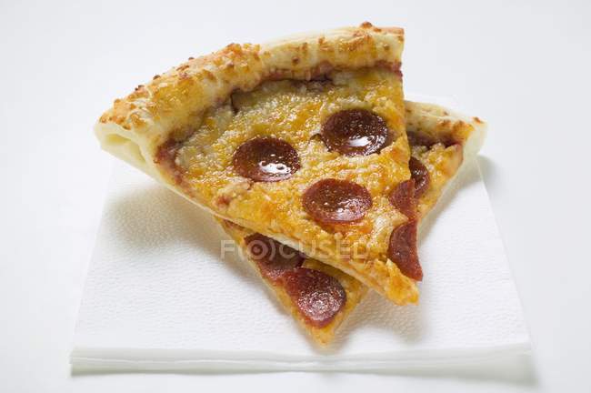Slices of pepperoni pizza — Stock Photo