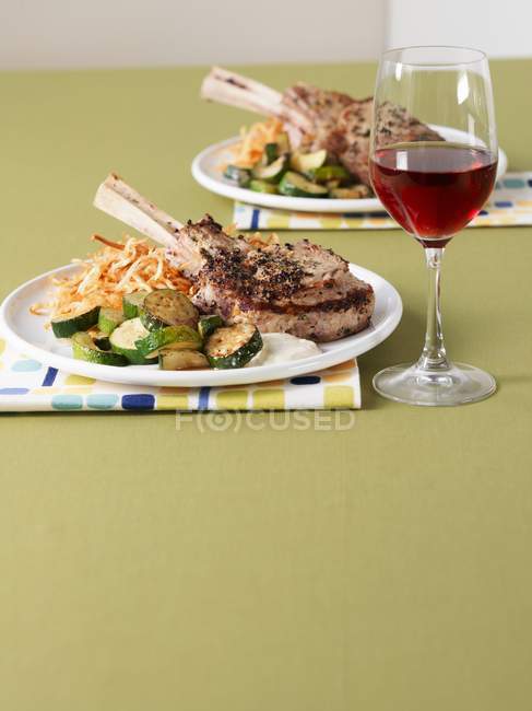 Veal chop with courgettes — Stock Photo