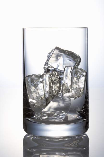 Ice cubes in glass — Stock Photo