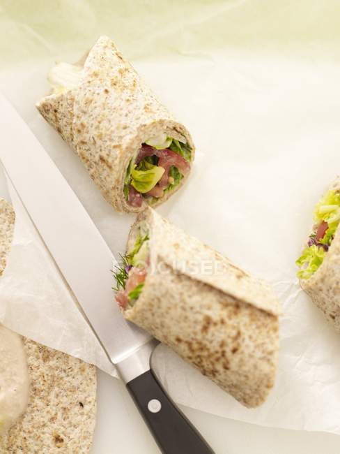 Wraps with salad and tuna spread filling — Stock Photo