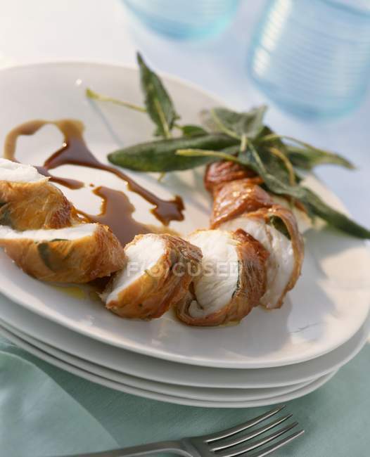 Monk fish wrapped in sage — Stock Photo