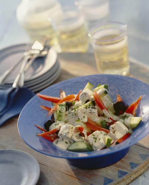 Greek salad with yogurt — Stock Photo