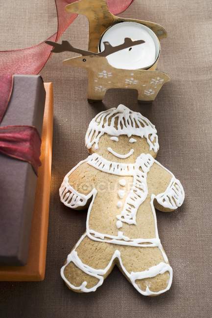 Gingerbread man on tablecloth — Stock Photo