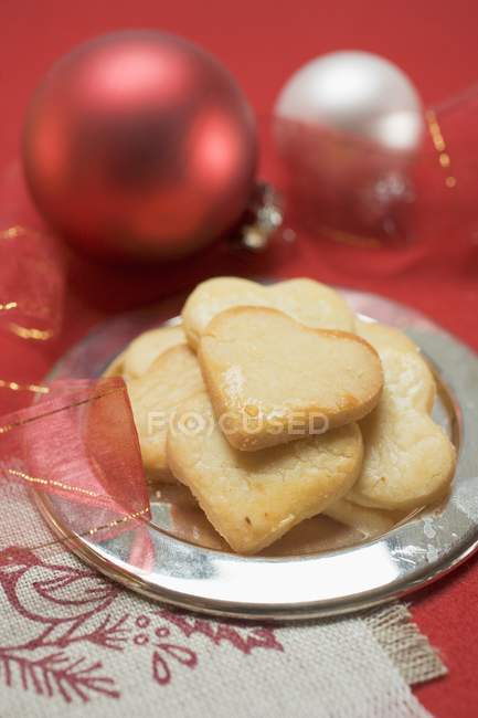 Christmas biscuits on silver plate — Stock Photo